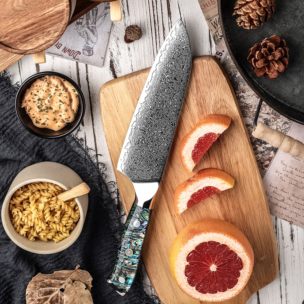 Cuchillo Santoku 18cm 10Cr+Lluvia Damasco66 Mango de Abalón con ingredientes de alta cocina