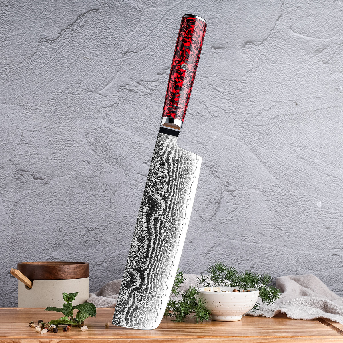 Cuchillo Nakiri 18cm S35VN+Ola Damasco66 Resina Roja y Carbono, con el cuchillo parado.